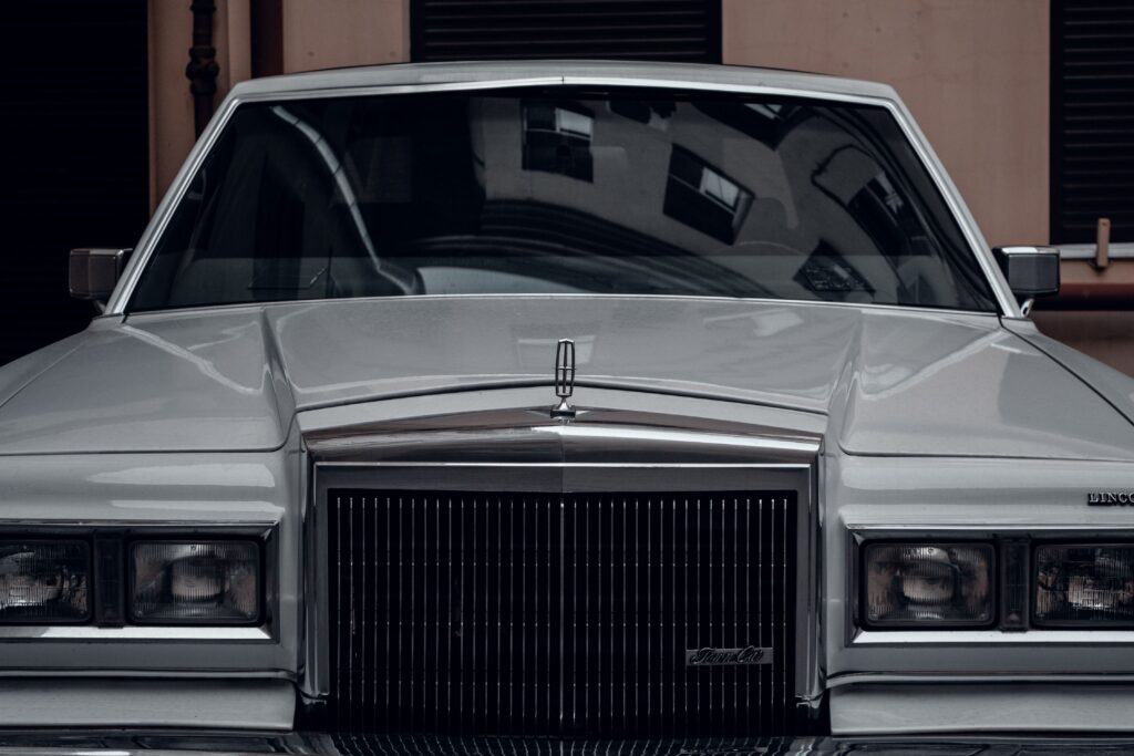 Front view of a classic Lincoln Continental Mark V in silver, showcasing vintage style and elegance.